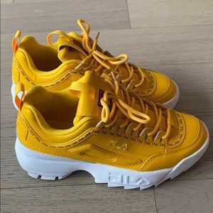 Yellow FILA platform sneakers